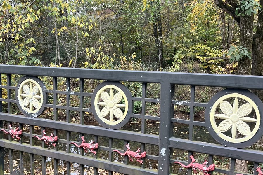Footbridge over a creek in autumn color